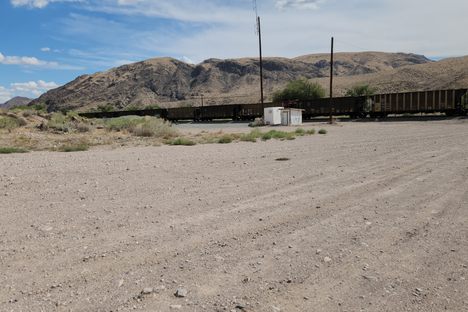 The railroad runs right by the schoolhouse, and it is still busy.  This is a moving train.