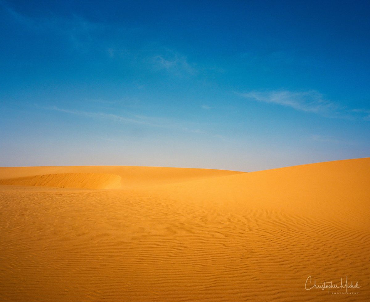 Sudan's color palette: blue and orange.