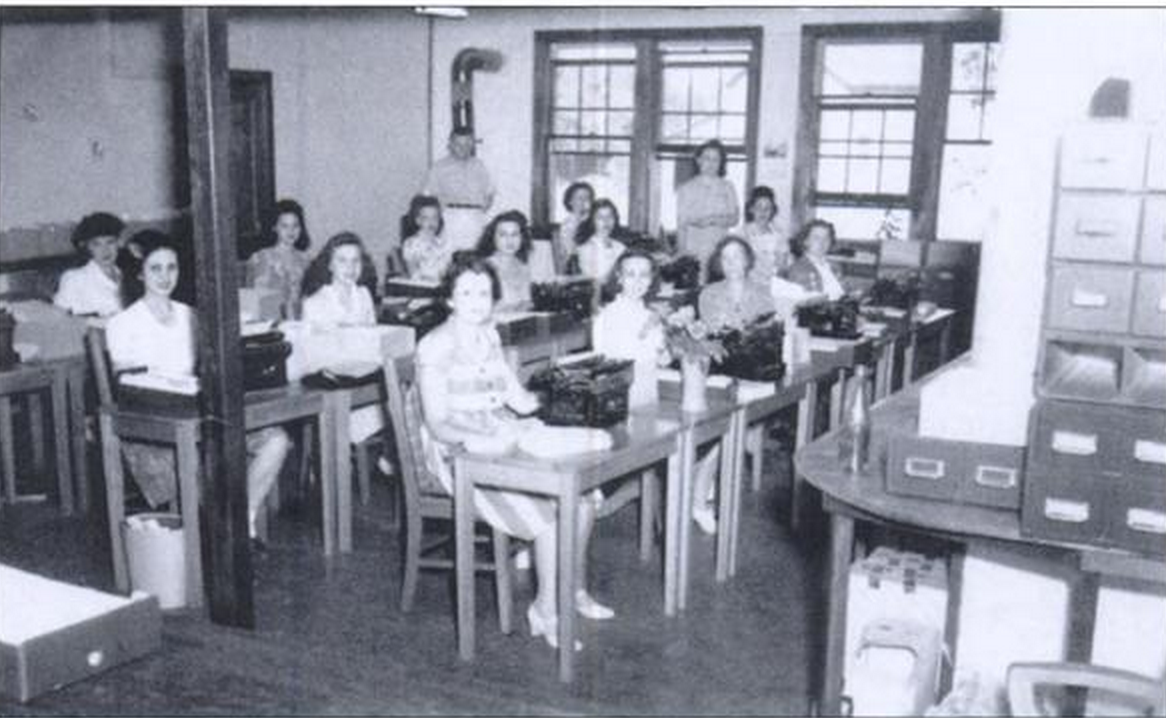 Stern and his staff, at his nursery office in Geneva in 1944. Stern is in the back near the stovepipe.