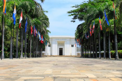 Entrance to the hacienda decorated with flags from the Americas.