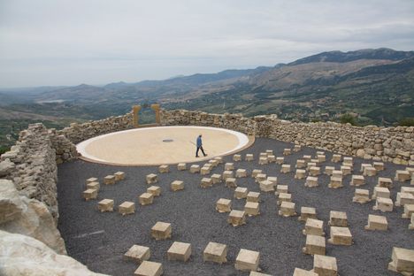 Lorenzo Reina with his singular creation in the Sicilian hills. 