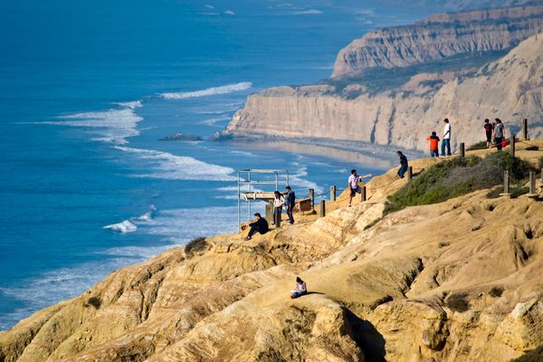  Visitors enjoy the views of Torrey Pines Cliffs.