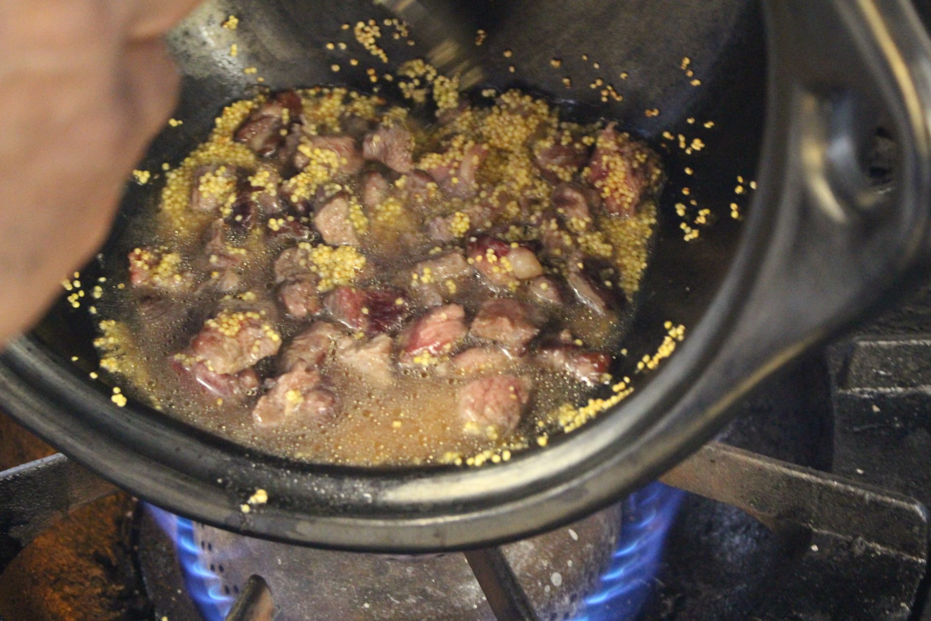 The team came closest to emulating the patterns on the ancient vessel when they cooked millet stew with a clay pot tipped on its side.