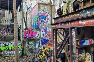 Graffiti on the exterior walls and the conveyor belt