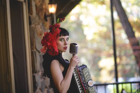 Erica Mancini serenades guests.