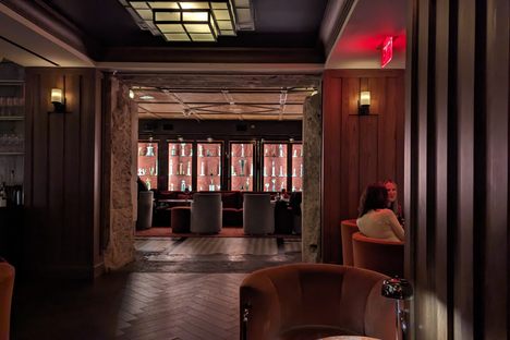 View of the trophy room from the communal couch area near the entrance.