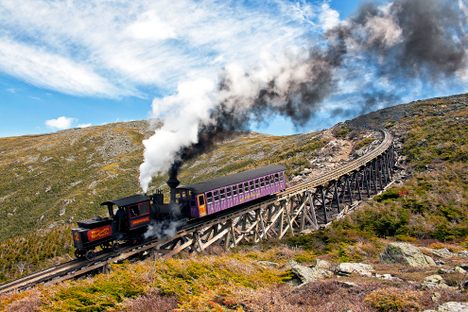 Mount Washington Cog Railway locomotive No. 2 pushes a train up Jacob’s Ladder, the steepest part of the railroad, in June 2009. 