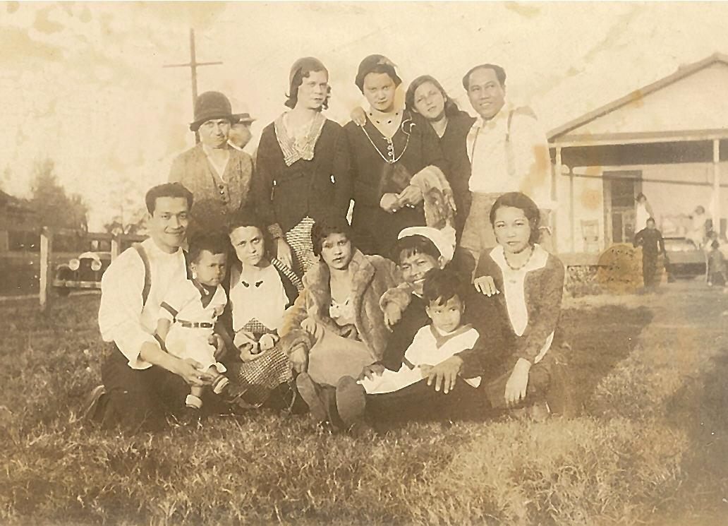 Rhonda Richoux's family has lived in Louisiana for six generations. Here, an undated photo shows members of her grandfather's family visiting her great-aunt's home in Gretna, just east of New Orleans.
