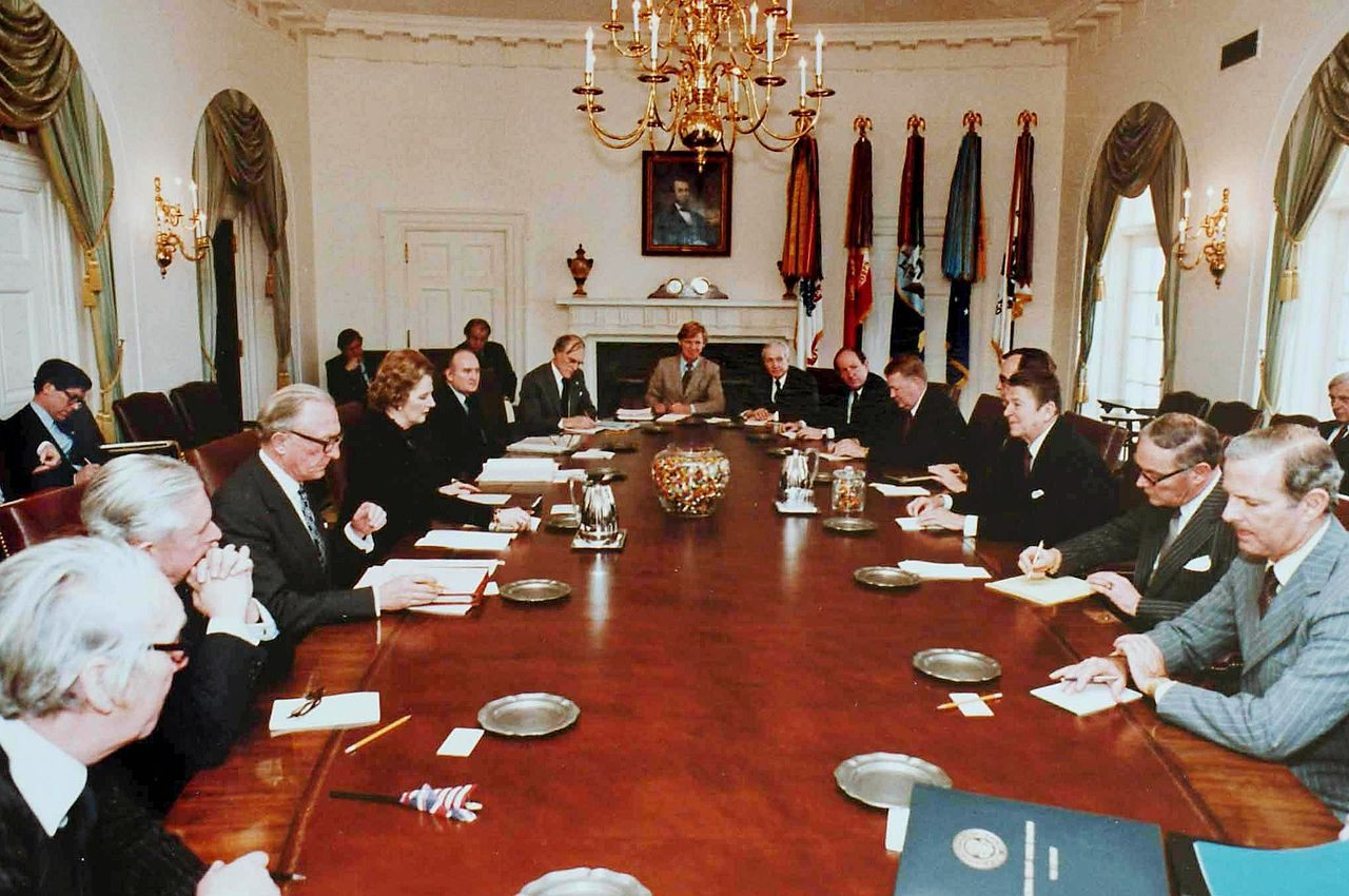 President Reagan and Prime Thatcher meet across a large jar of jelly beans, 1981.