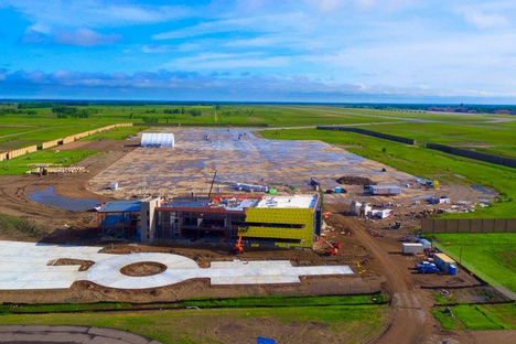 Drone's-eye view of Grand Sky from front gate