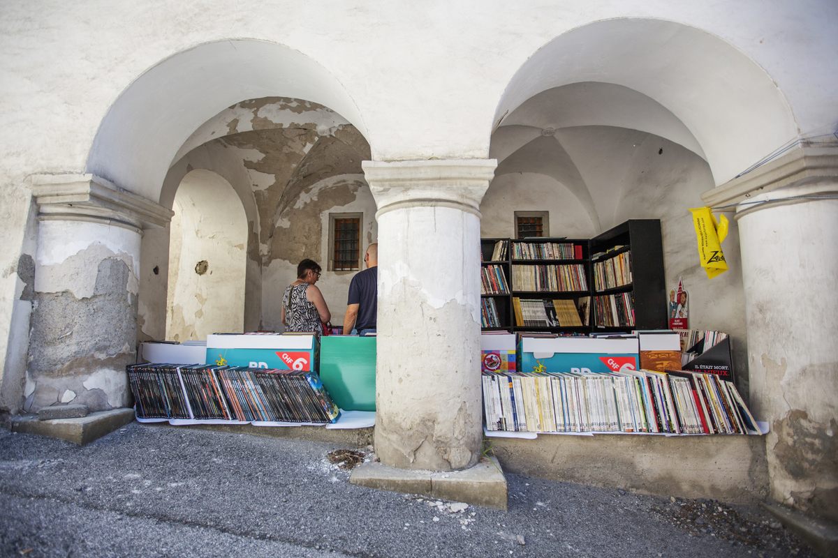 Books hide behind arches in St.-Pierre-de-Clages, Switzerland.