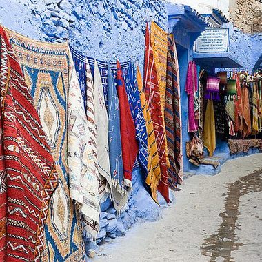 Items for sale in a blue alley in Chefchaouen. (magda-maciek/Flickr) 