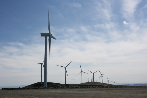 Silhouetted turbines.