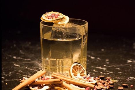 Clarified milk punch made from Hennessy, plum liqueur, hazelnut liqueur, sherry, orgeat, lemon, orange, poppy, cinnamon, vanilla, and coffee.