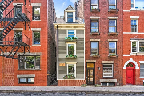The origins of the skinny house at 44 Hull Street are uncertain.
