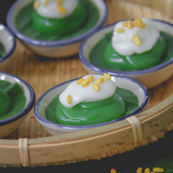 Pandan and mung bean topped with coconut cream.