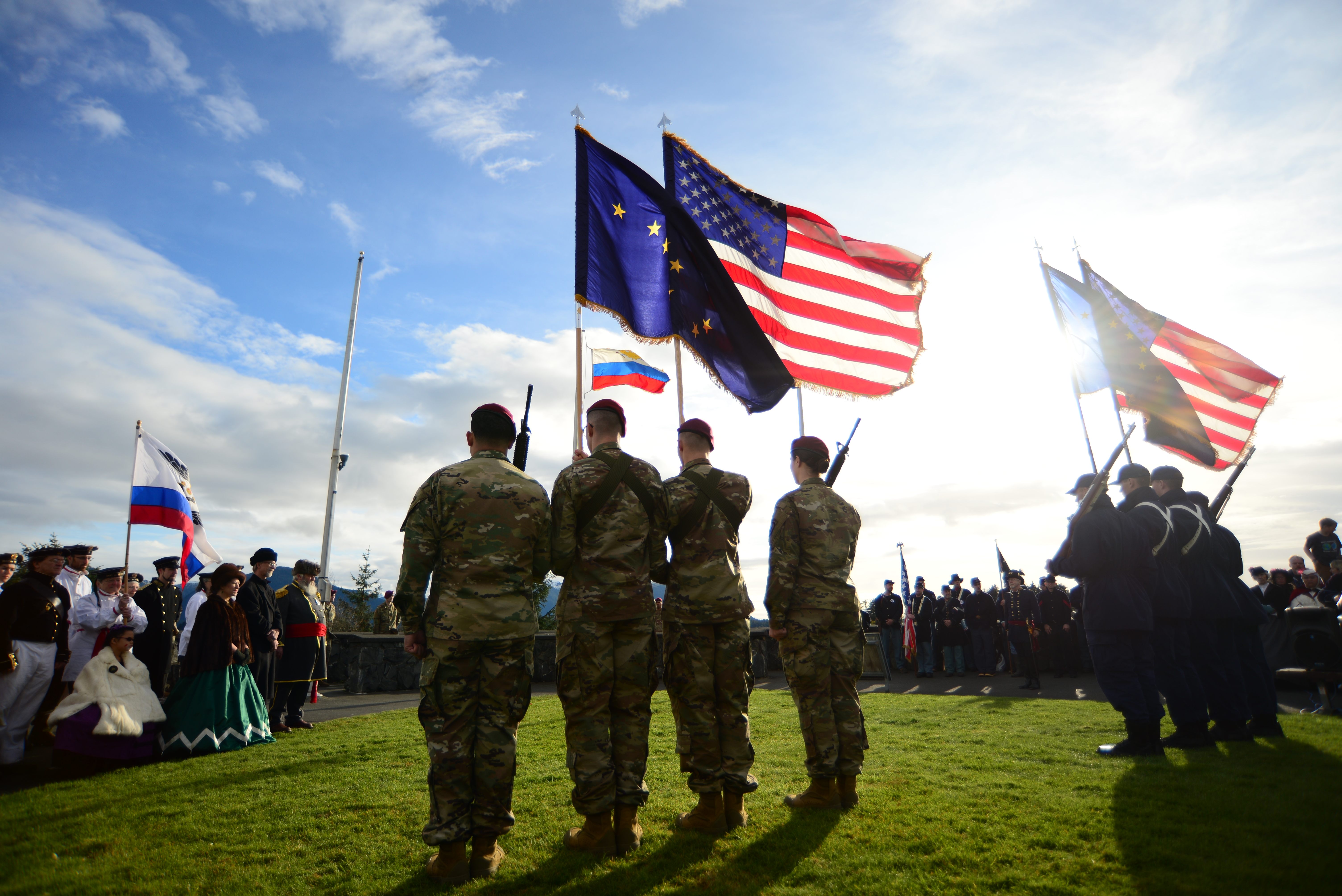 Alaskans re-enact the ceremony that transferred Alaska from Russia to the United States as part of the annual Alaska Day.