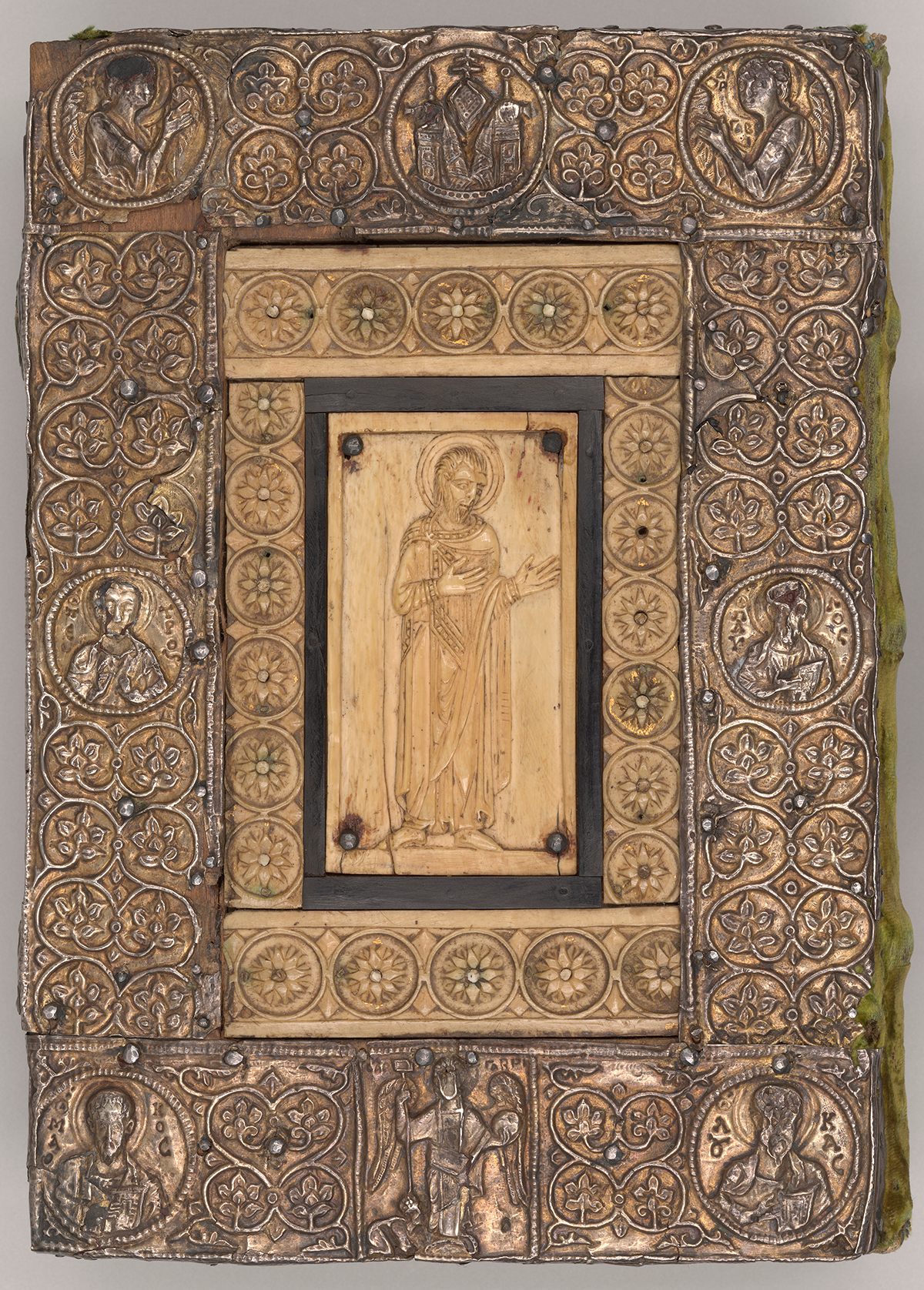 Silver-gilt cover with ivory, <em>Sacramentary of Frontale</em>, c. 1050.