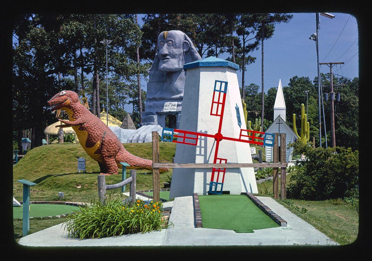 <em>Windmill and dinosaur view 1, Wacky Golf</em>, South Carolina, 1979.