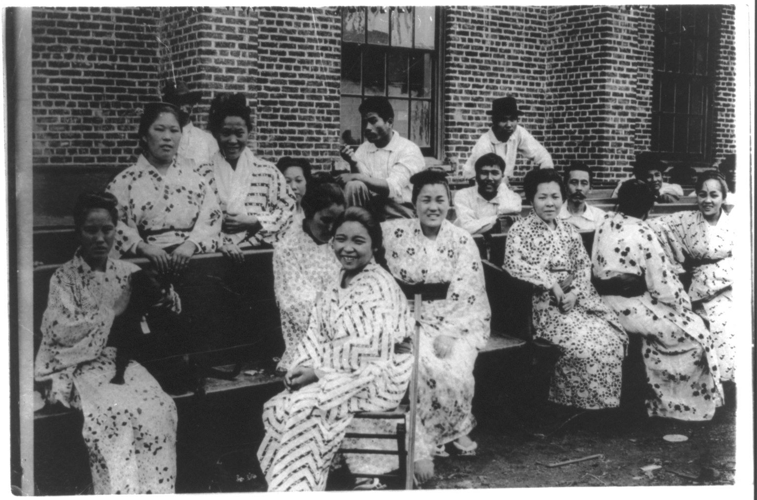 Recently arrived Japanese immigrants pose in traditional clothes in Hawai'i, 1910.