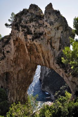 Arco Naturale“ is a natural limestone arch that forms a bridge between two  pillars of rock.