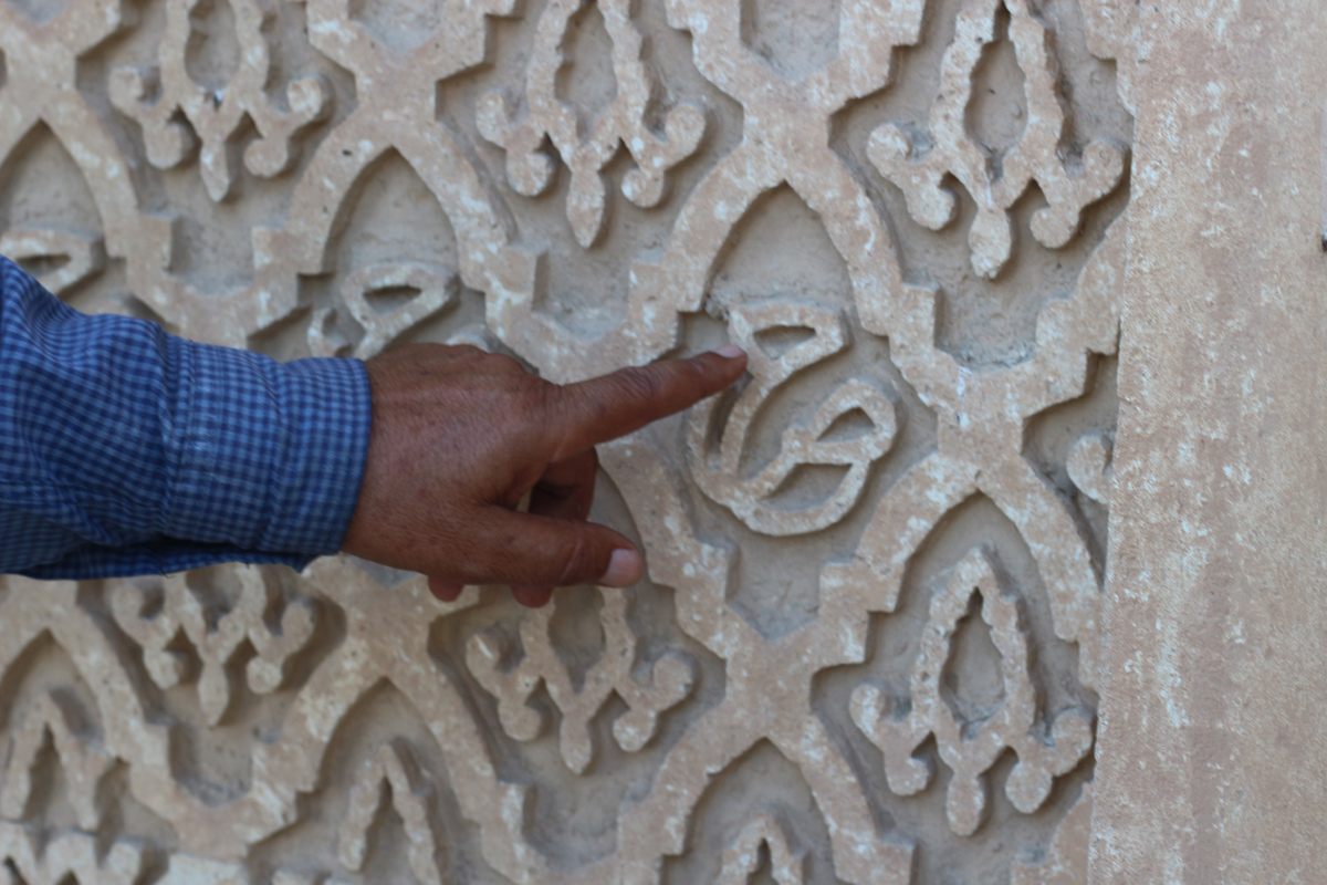 The walls of Saddam's former palace are covered with his initials in traditional Arabic calligraphy.