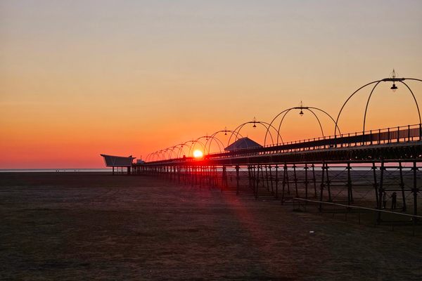The Sun Setting Over Southport Pier